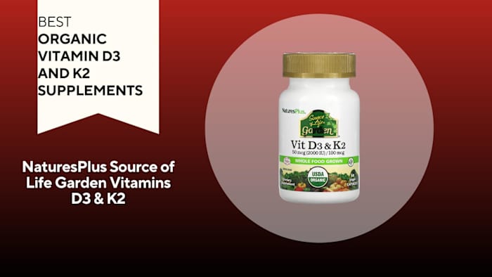A bottle of NaturesPlus Source of Life Garden Vitamins D3 & K2 is pictured against a red background